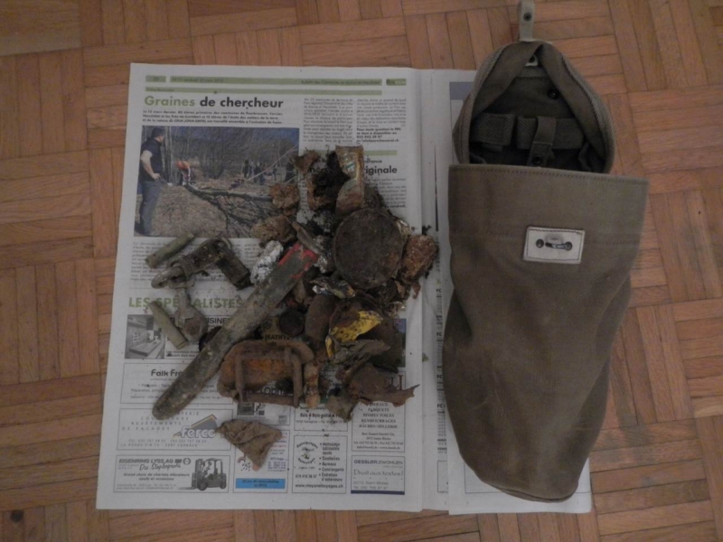Les déchets et le sac à déchets à porter à la ceinture.