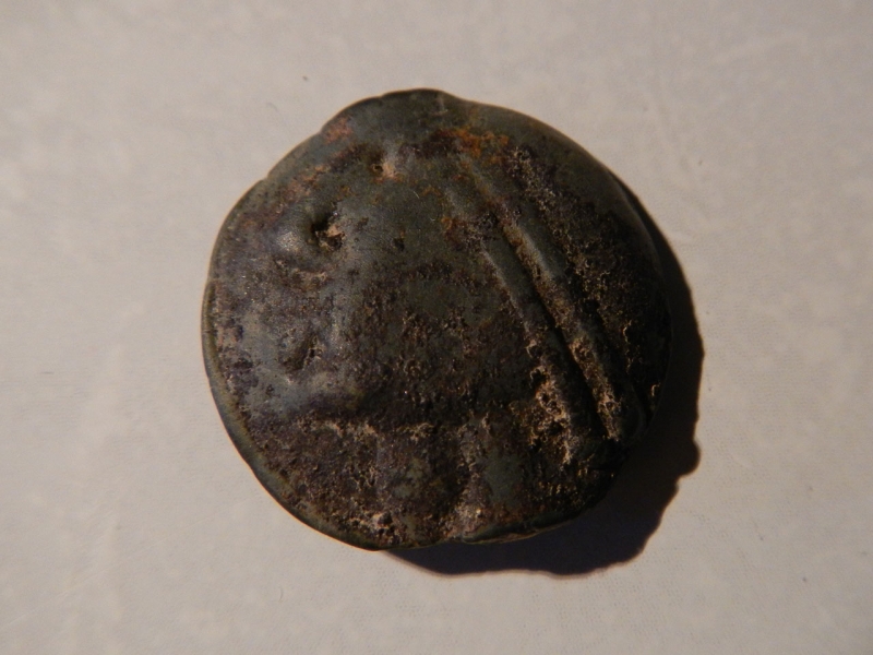 Potin Celtique à tête casquée et annelets pointés